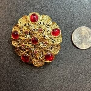 Vintage Round Gold Tone Brooch with Red Stones Unsigned